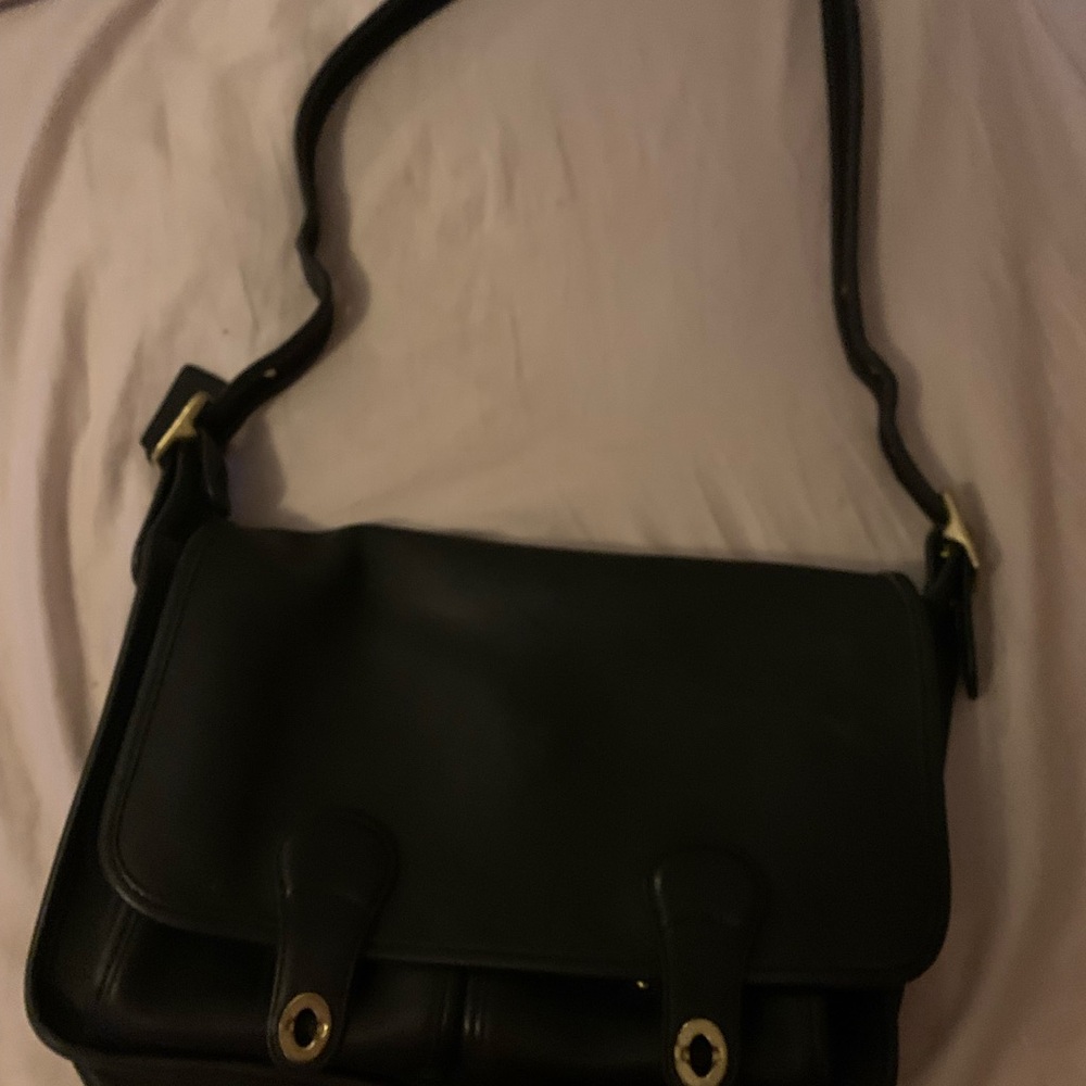 Coach Black Messenger Bag with Adjustable Strap and Flap Closure